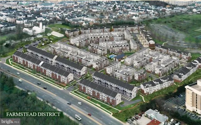 a living room with furniture a large window and wooden floor