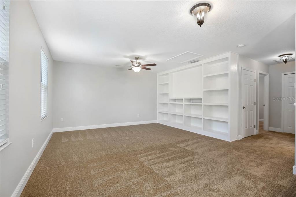 5310 Match Point Place Lithia, FL 33547 - Photo 14 of 33 an empty room with a empty space and windows