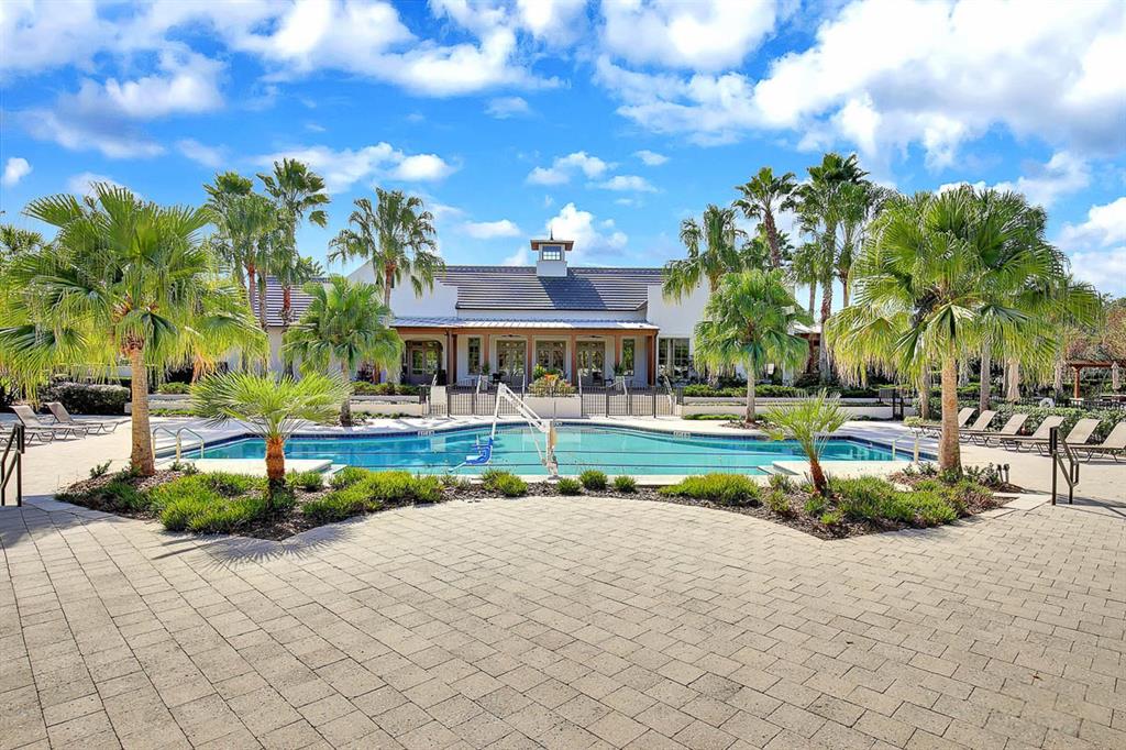 5310 Match Point Place Lithia, FL 33547 - Photo 31 of 33 a view of swimming pool and trees in the background