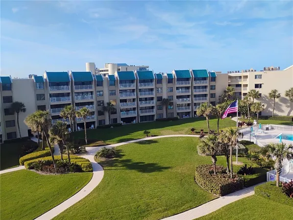 a view of yard with swimming pool outdoor seating and city view