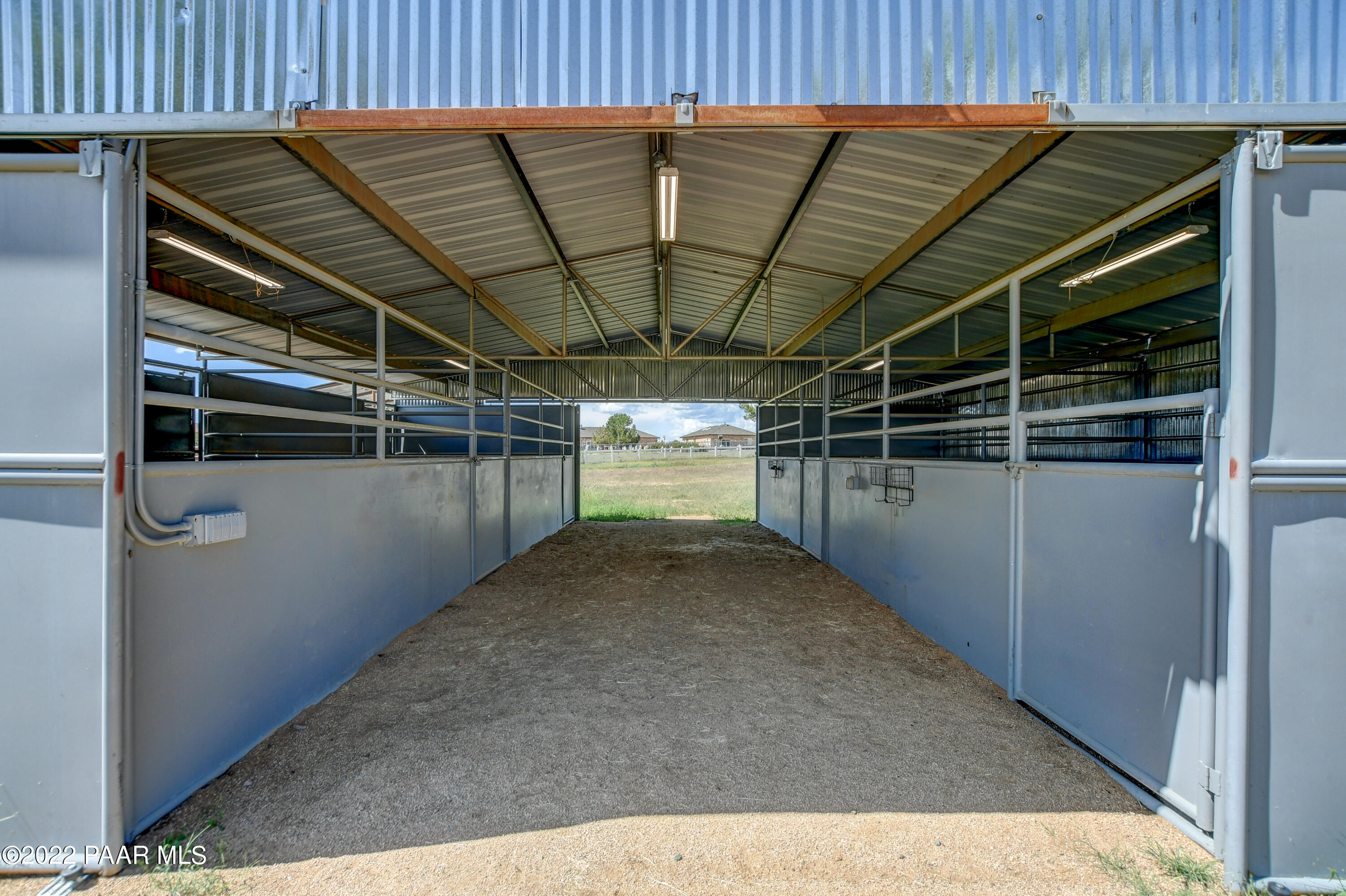 3875 Friendly Meadow Road Prescott, AZ 86305 - Photo 48 of 68 Center Barn Aisle