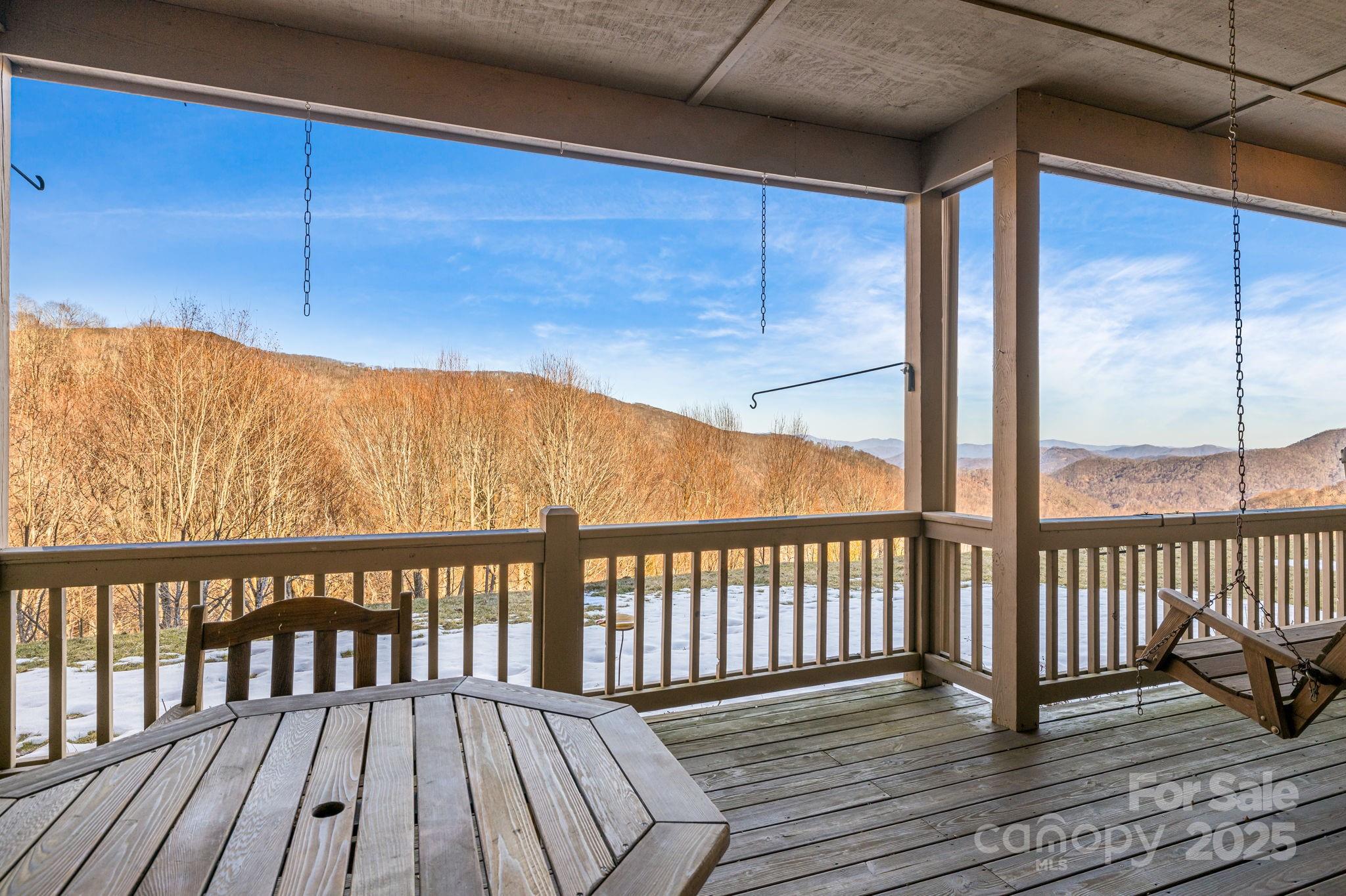 2521 Wolf Laurel Road, Unit 104 Mars Hill, NC 28754 - Photo 24 of 47 a view of wooden balcony