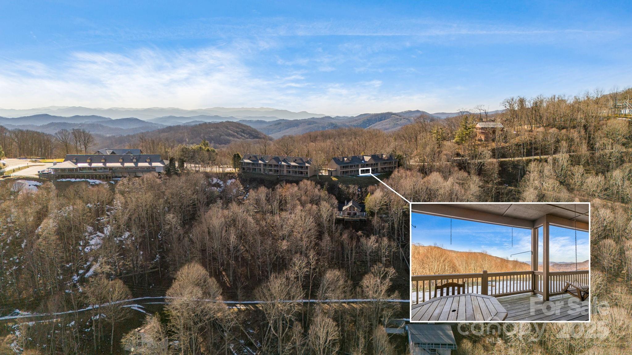 2521 Wolf Laurel Road, Unit 104 Mars Hill, NC 28754 - Photo 3 of 47 a view of city and mountain