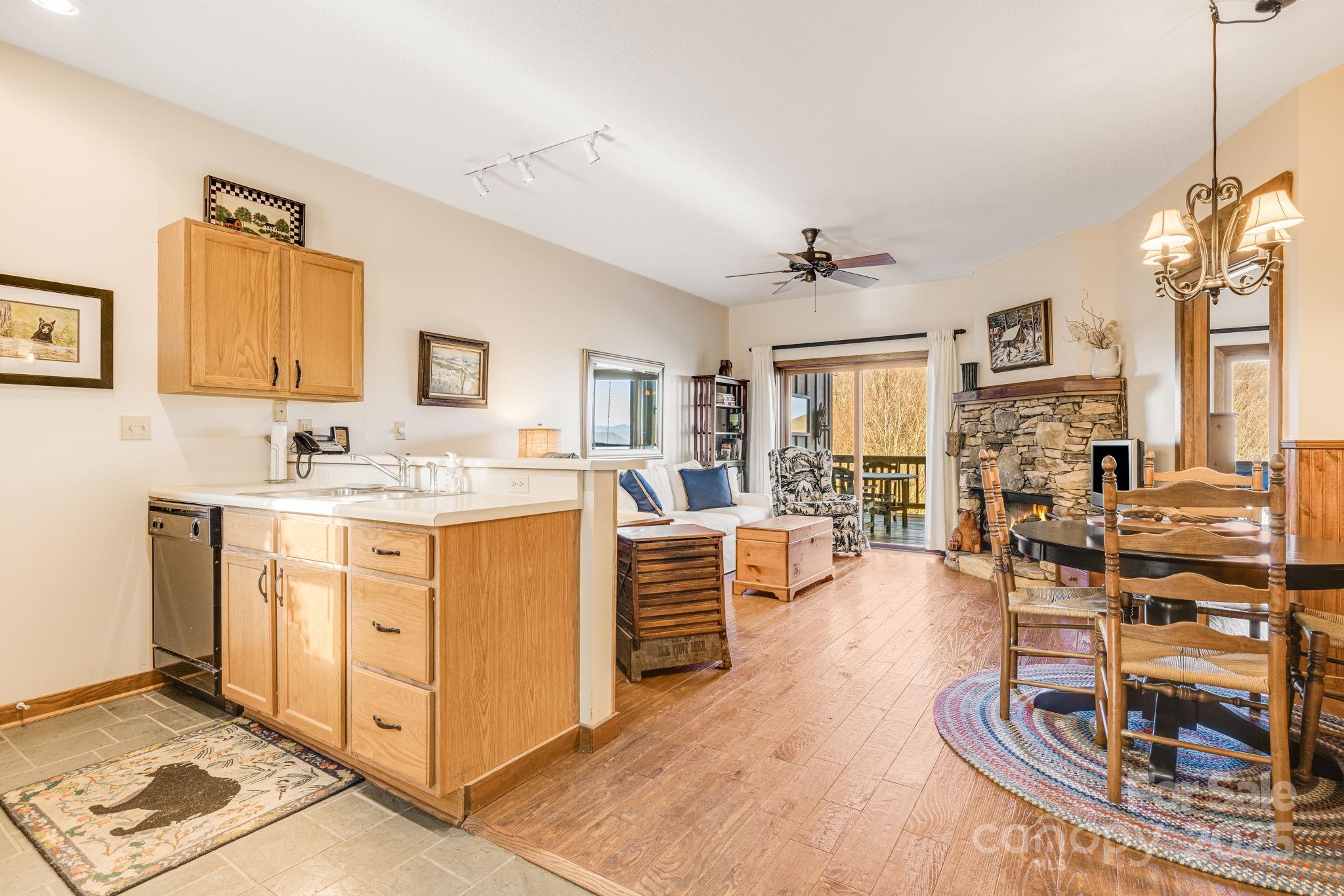 2521 Wolf Laurel Road, Unit 104 Mars Hill, NC 28754 - Photo 7 of 47 a view of kitchen center island and stainless steel appliances