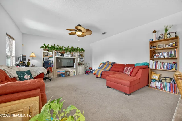 a view of a hallway with stairs