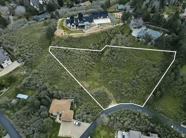 10667 Hidden Ridge Lane Sandy, UT 84092 - Photo 21 of 21 Aerial perspective of suburban area featuring property parcel outlined