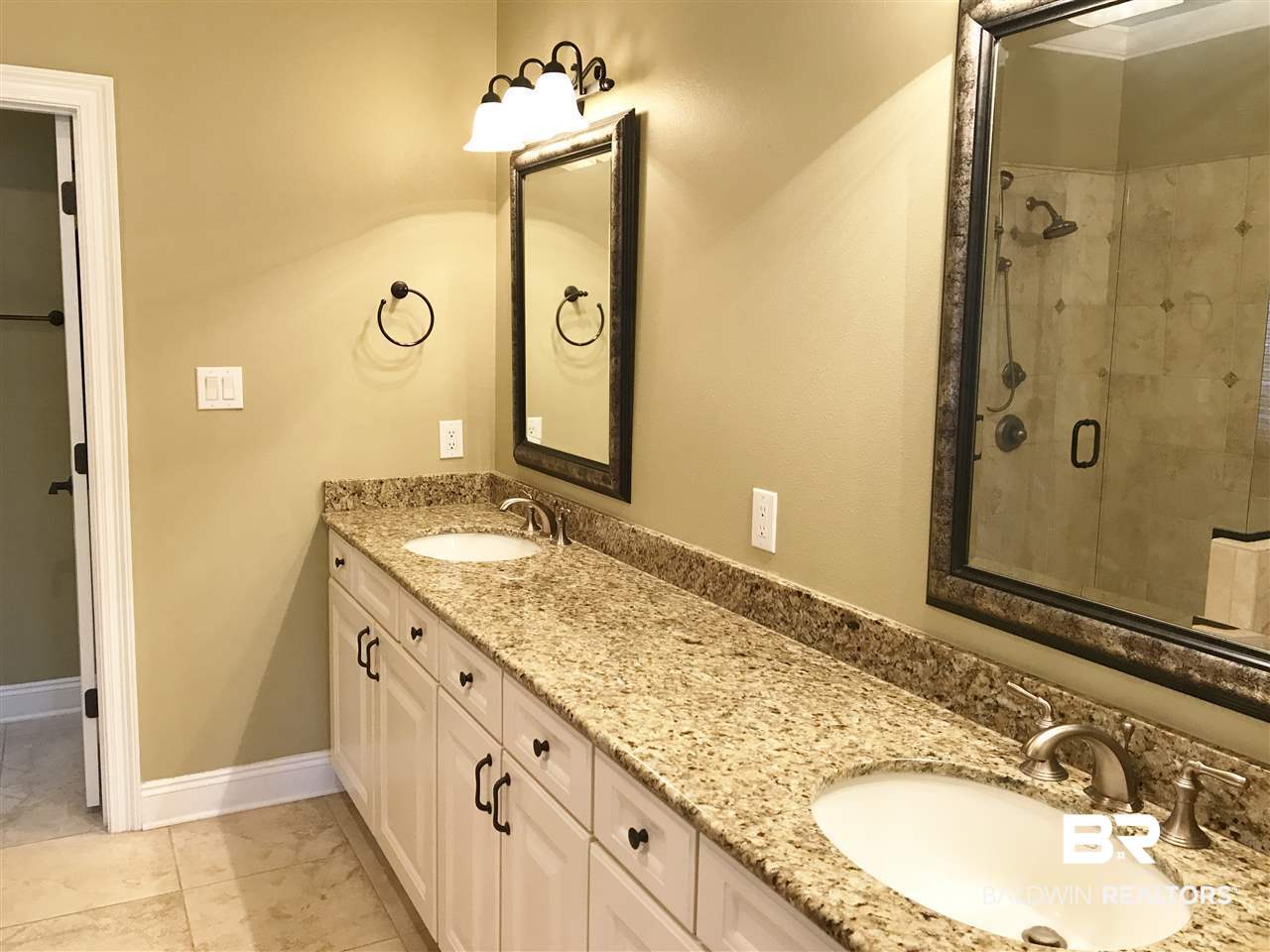 30840 West Ono North Loop Orange Beach, AL 36561 - Photo 27 of 49 Granite counters and tile floors