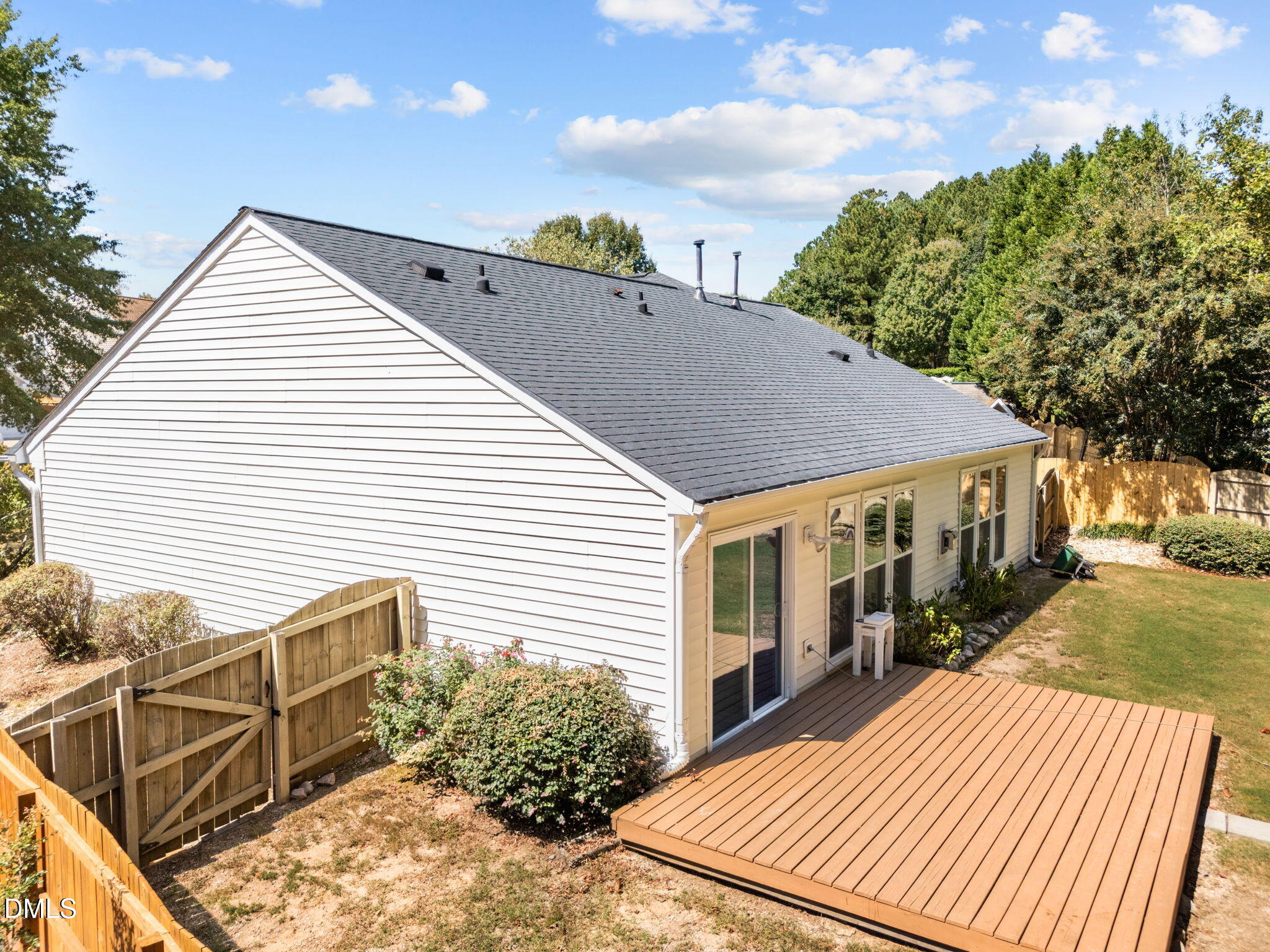 104 Saddle River Road Apex, NC 27502 - Photo 26 of 42 a view of a house with a yard