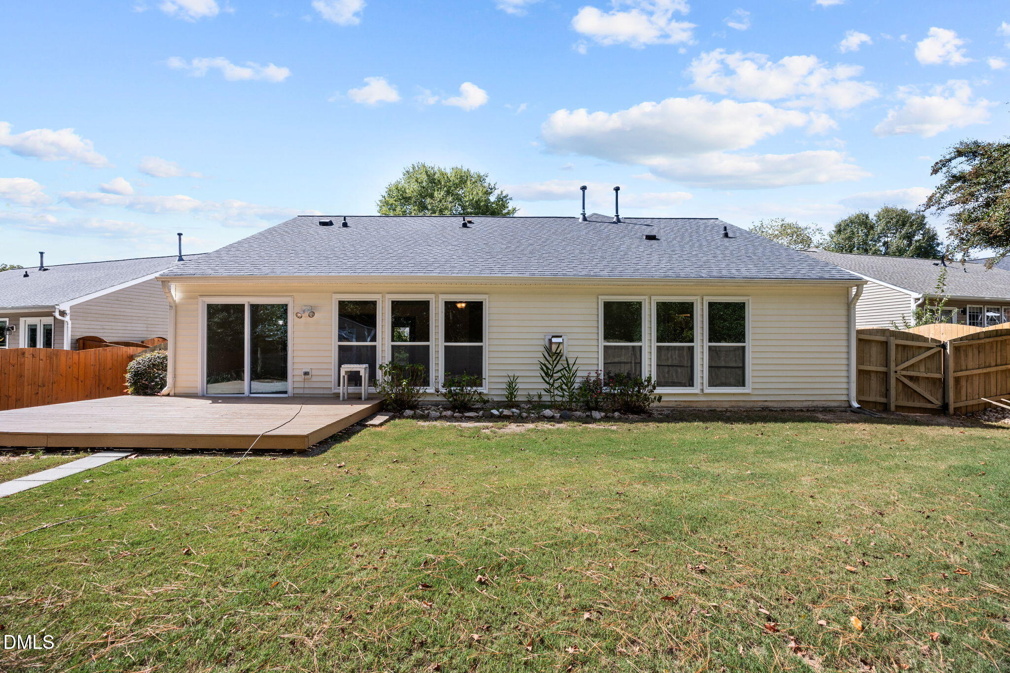 104 Saddle River Road Apex, NC 27502 - Photo 27 of 42 a front view of house with yard and seating space