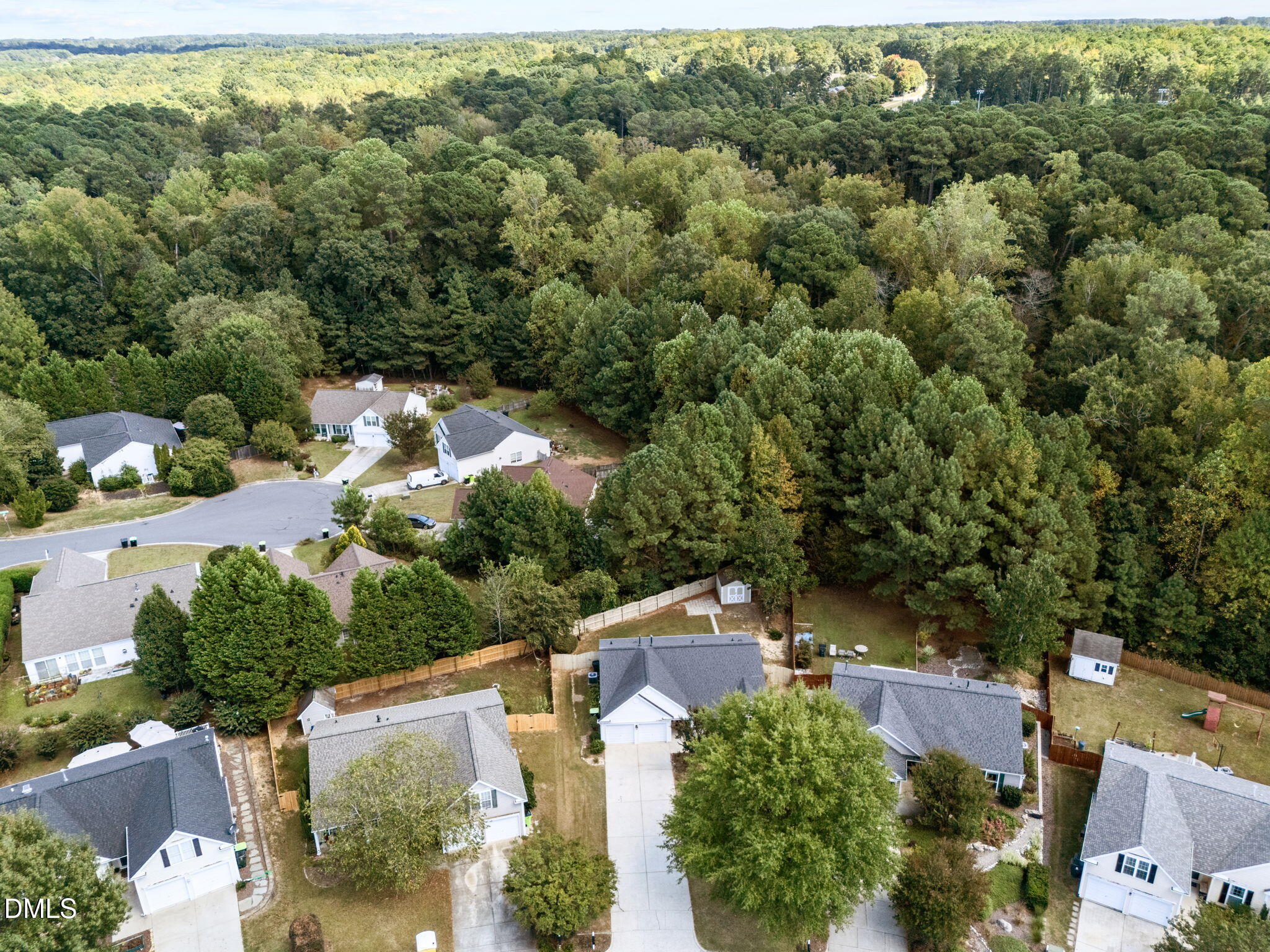 104 Saddle River Road Apex, NC 27502 - Photo 33 of 42 an aerial view of a house with yard