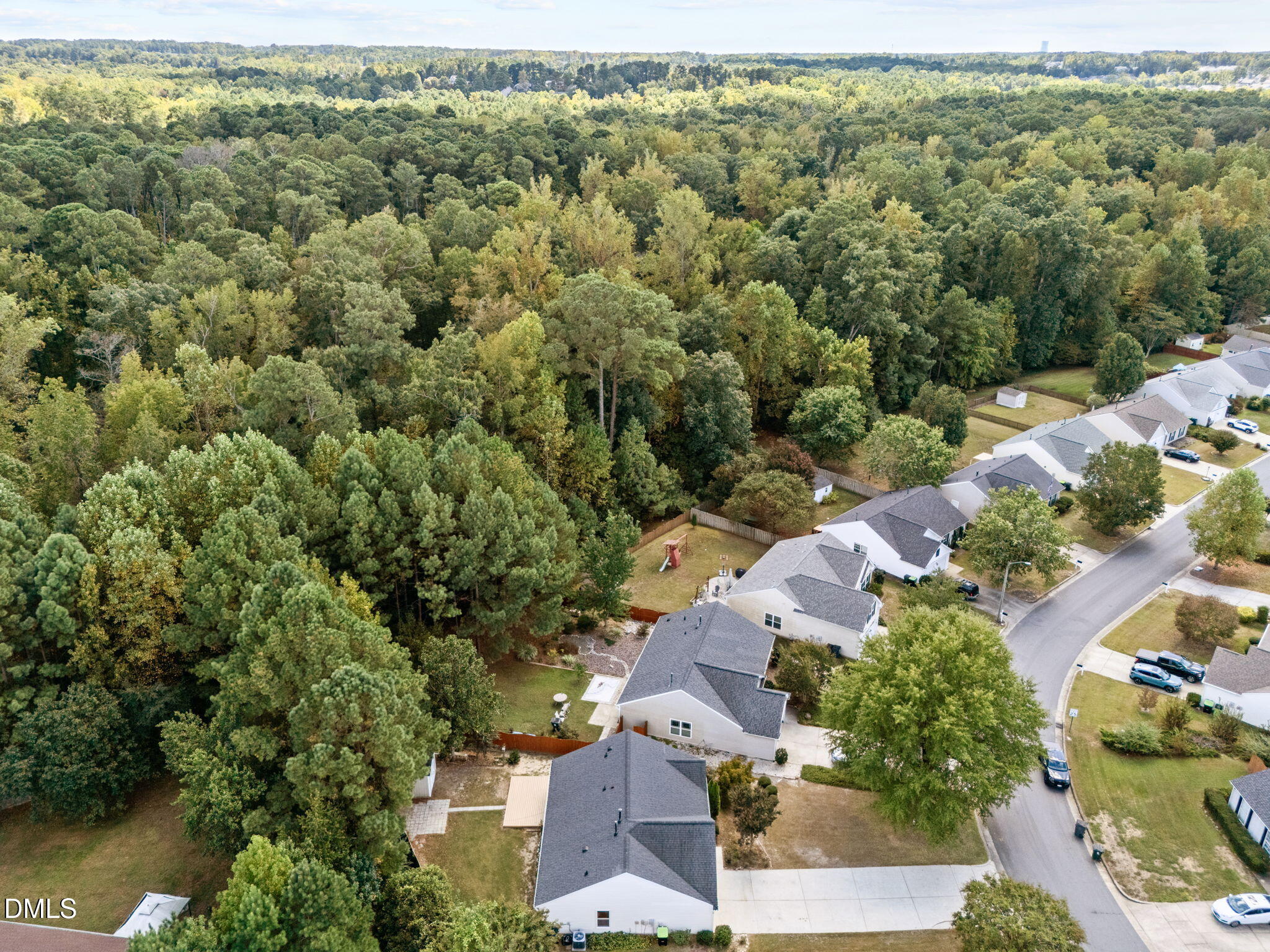 104 Saddle River Road Apex, NC 27502 - Photo 35 of 42 an aerial view of a house with a yard