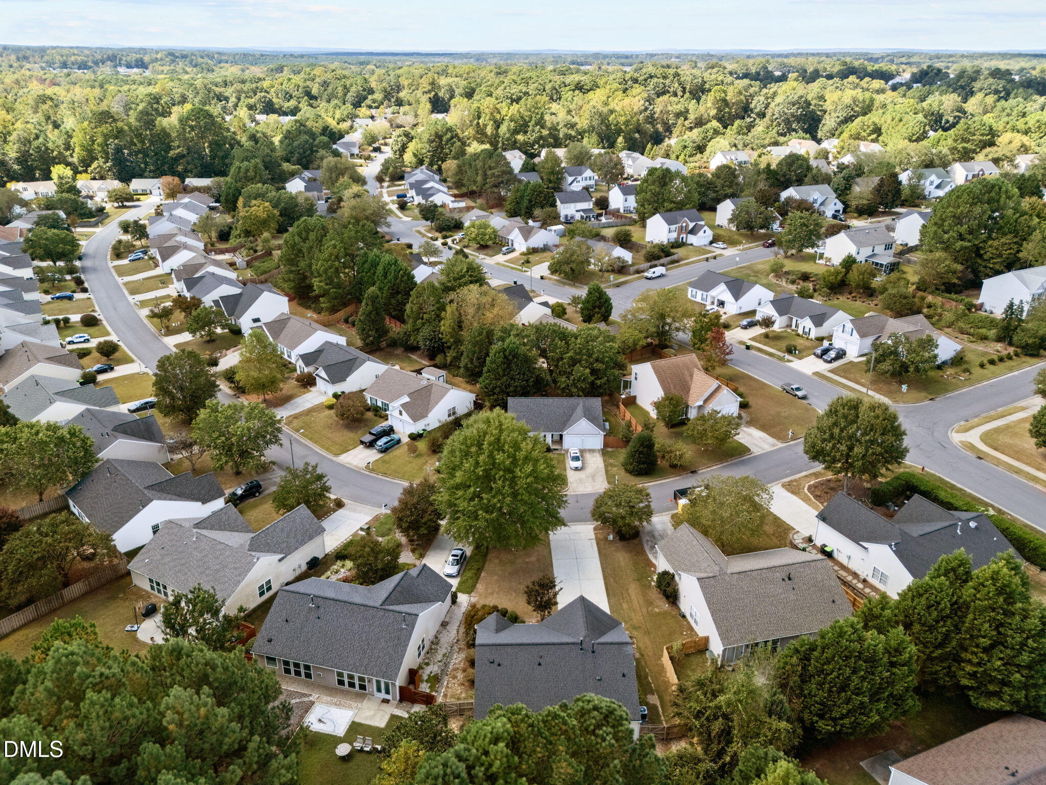 104 Saddle River Road Apex, NC 27502 - Photo 37 of 42 an aerial view of residential houses with outdoor space