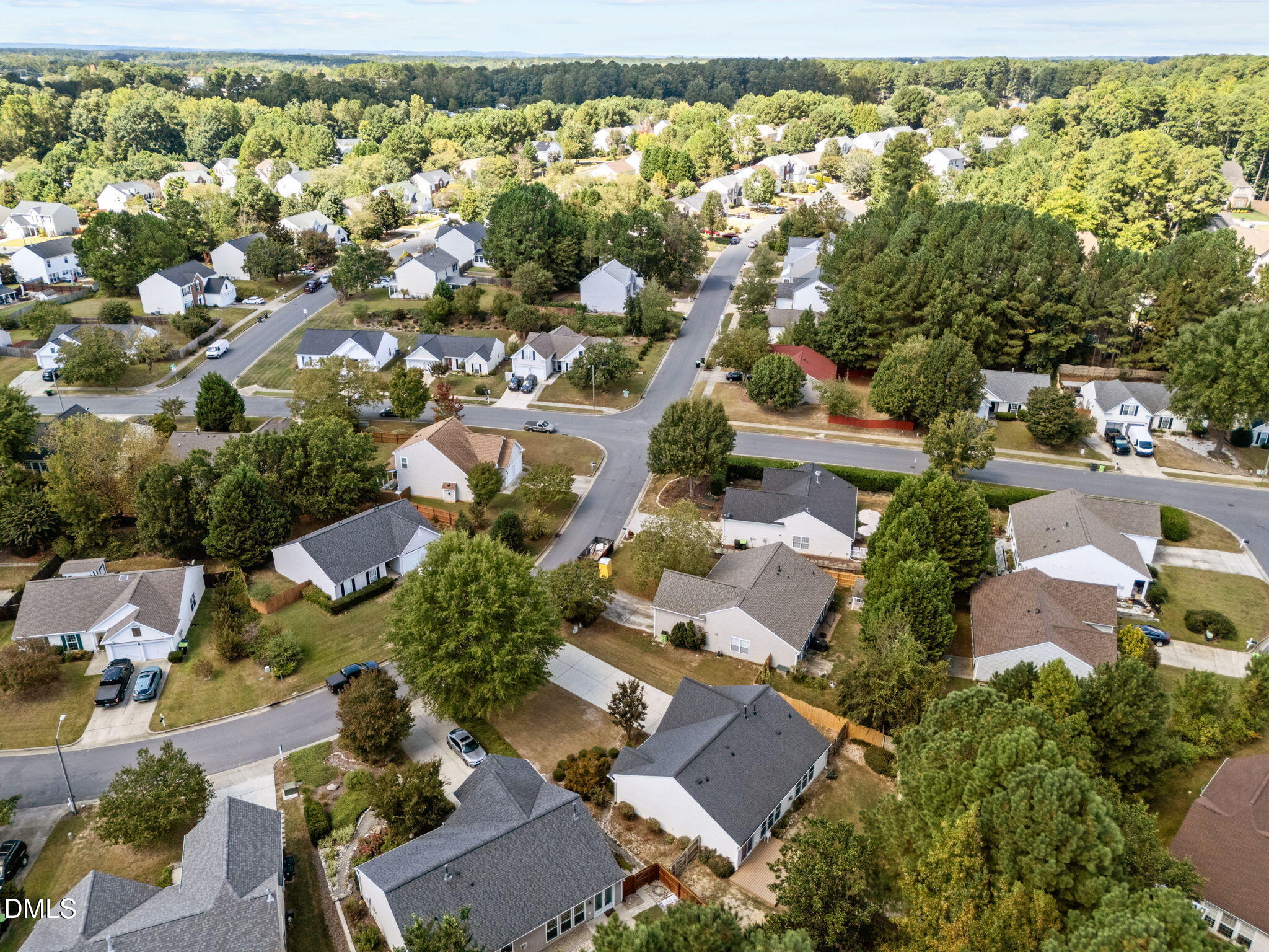 104 Saddle River Road Apex, NC 27502 - Photo 38 of 42 an aerial view of residential houses with outdoor space