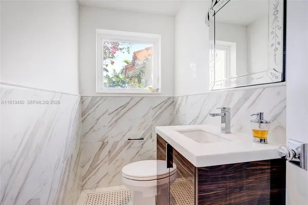 a bathroom with a sink and a toilet