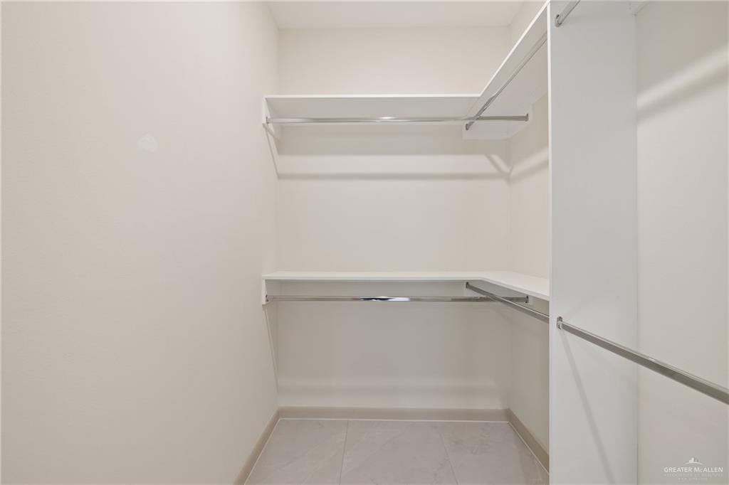 1806 West Violet Drive, Unit 3 Pharr, TX 78577 - Photo 13 of 15 a view of an empty walk in closet