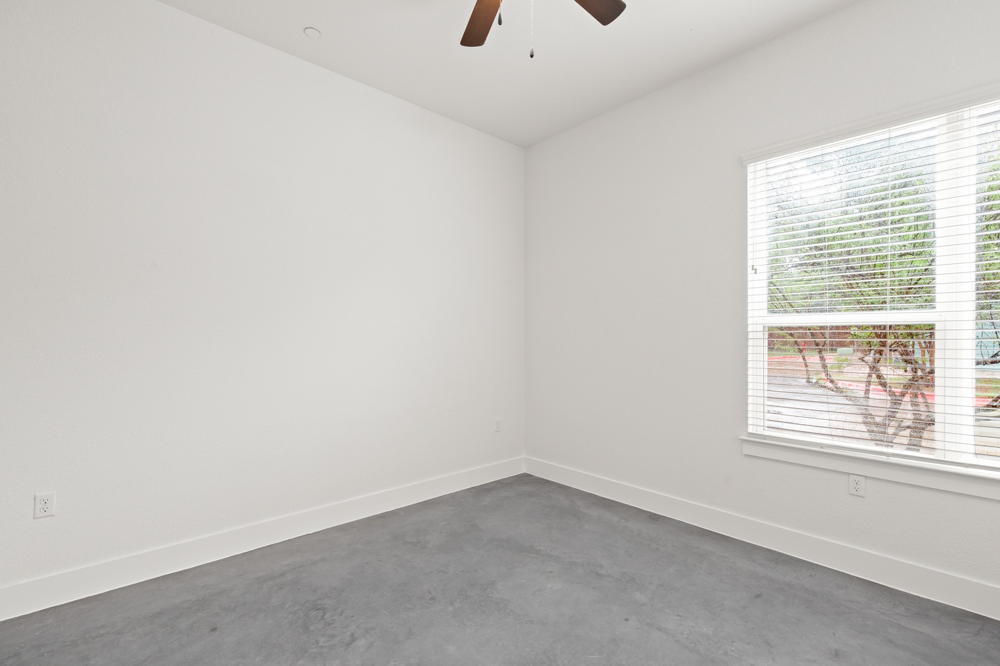 8922 Manchaca Road, Unit 701 Austin, TX 78748 - Photo 9 of 25 an empty room with a window
