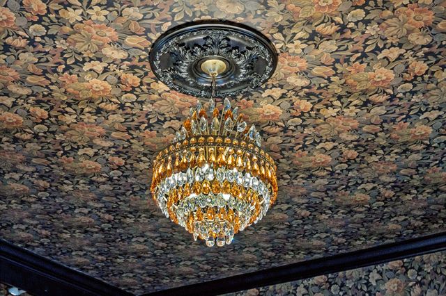 a view of front door of house with outdoor seating