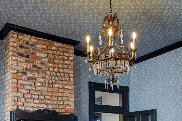 a bedroom with a bed and a desk