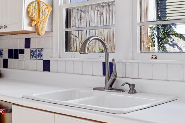 a view of a wooden deck with furniture
