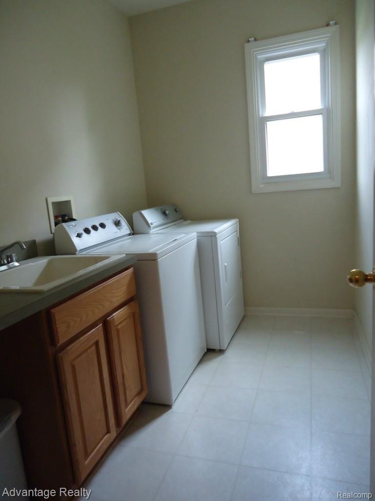 2034 Baron Rochester, MI 48307 - Photo 14 of 26 laundry room includes washer & dryer