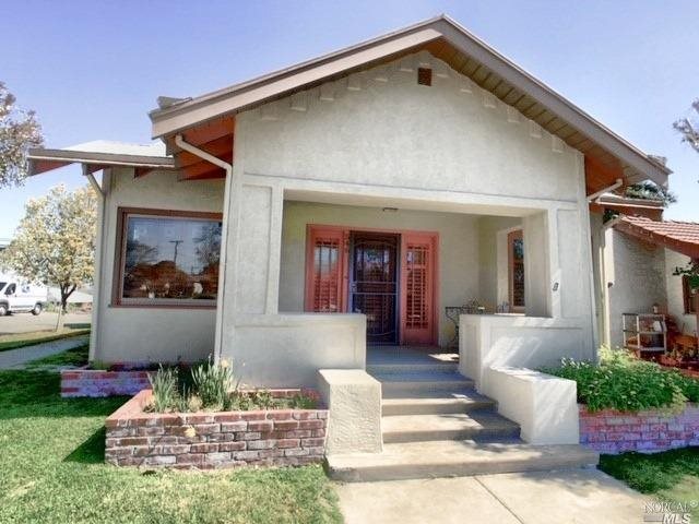 546 Main Street Rio Vista, CA 94571 - Photo 1 of 1 a front view of a house with garden