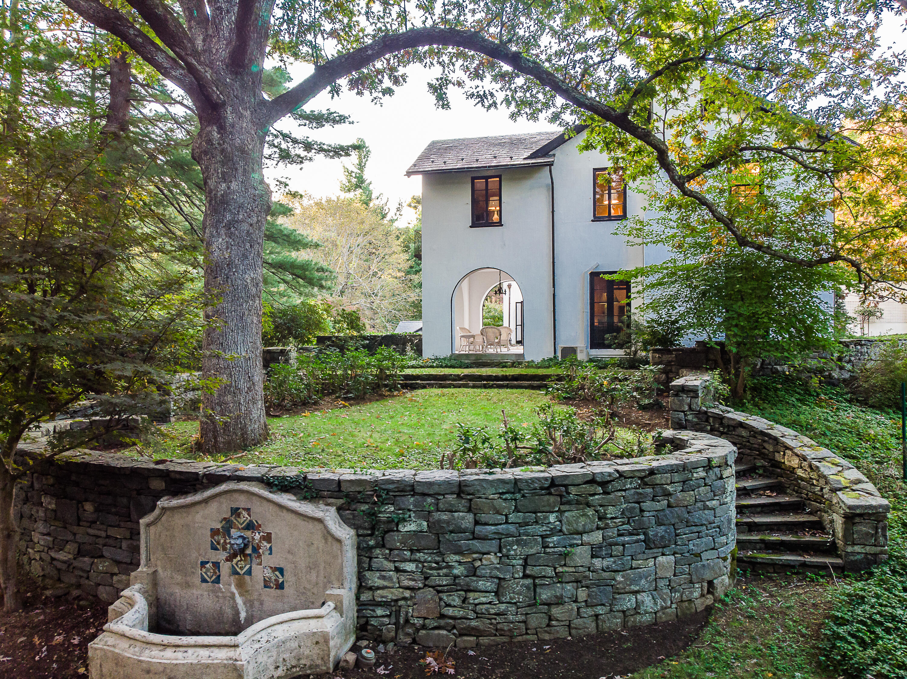 684 Westover Road Stamford, CT 06902 - Photo 12 of 25 a front view of a house with garden