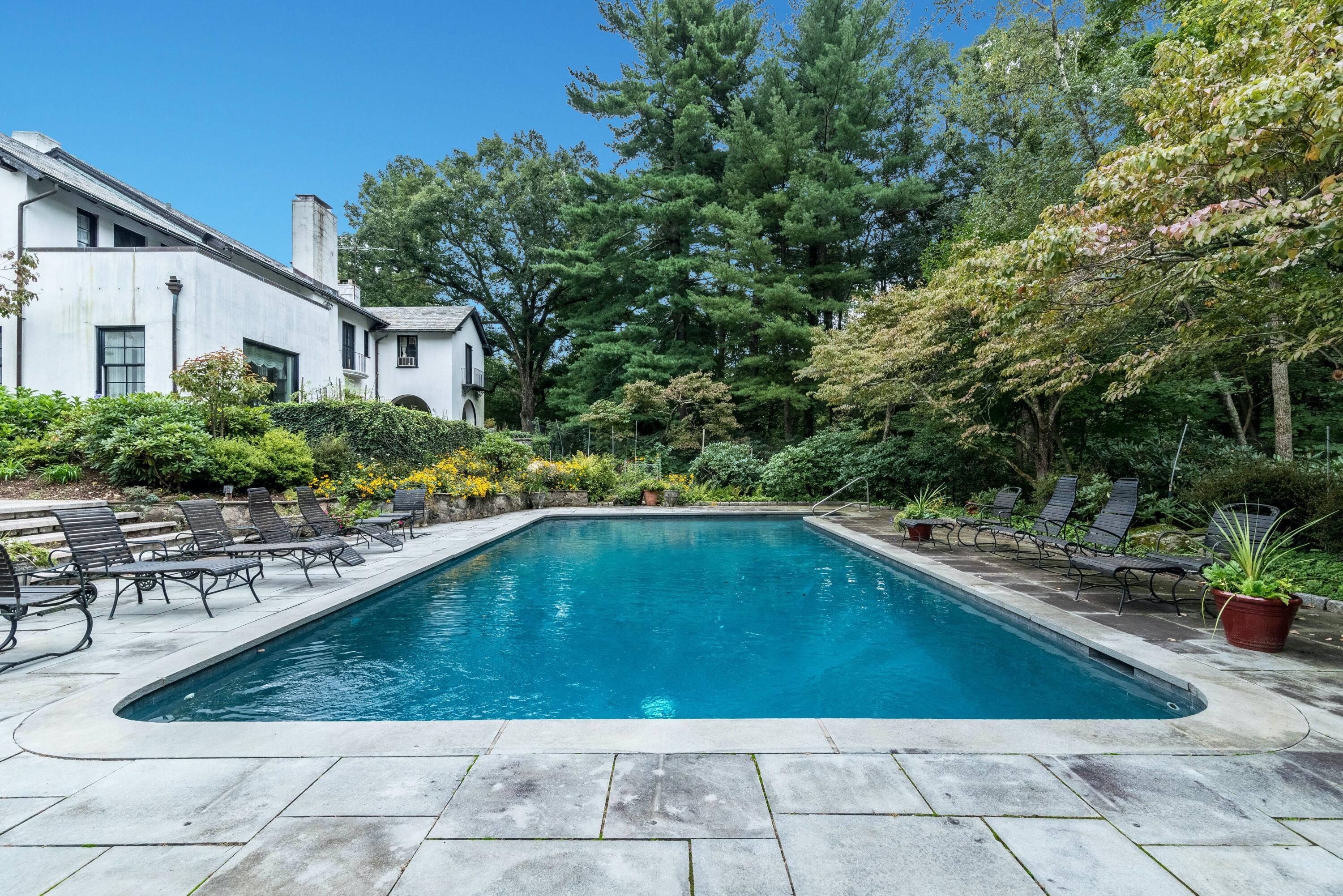 684 Westover Road Stamford, CT 06902 - Photo 17 of 25 a view of swimming pool with outdoor seating