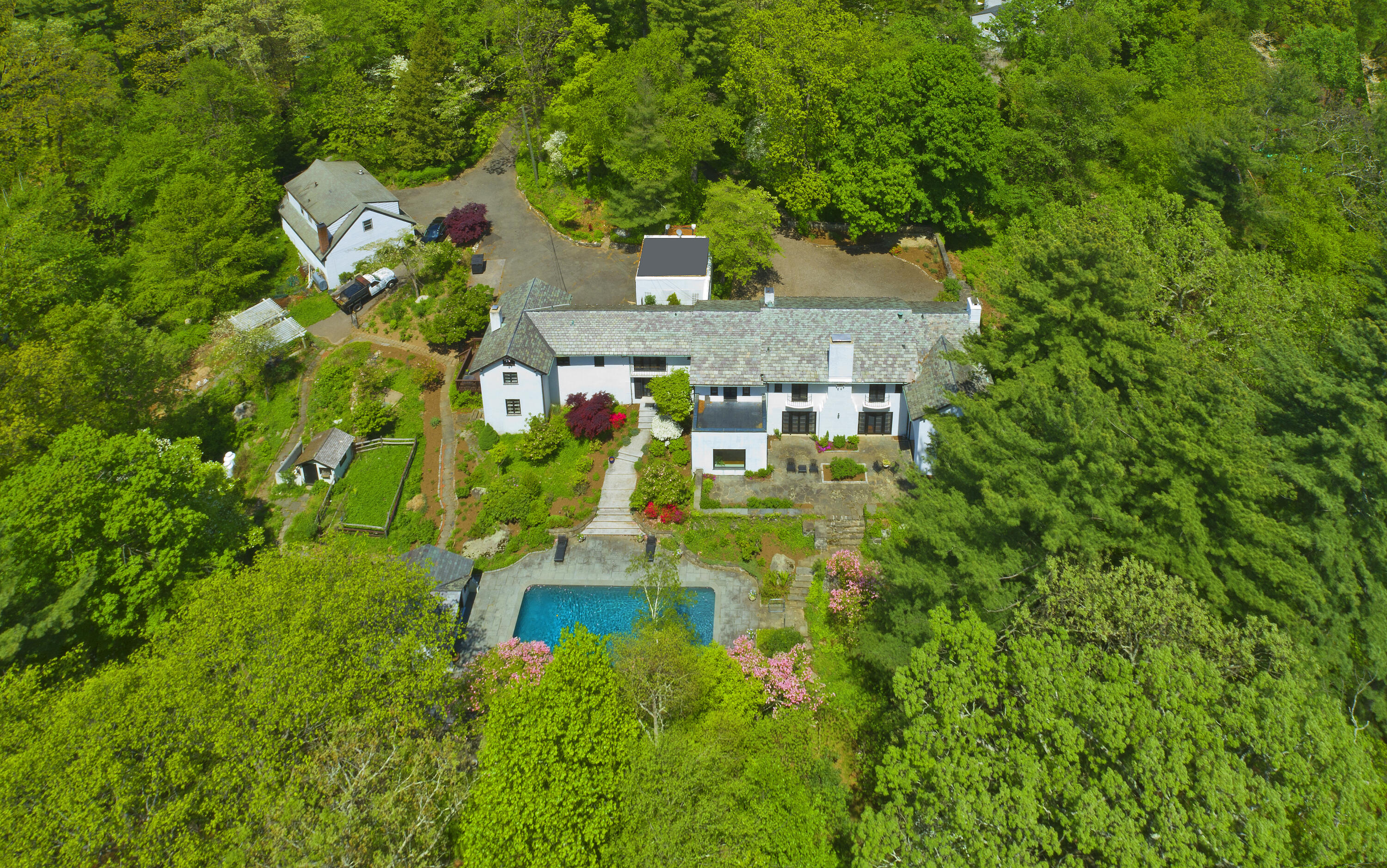 684 Westover Road Stamford, CT 06902 - Photo 22 of 25 a view of a house with a yard and garden