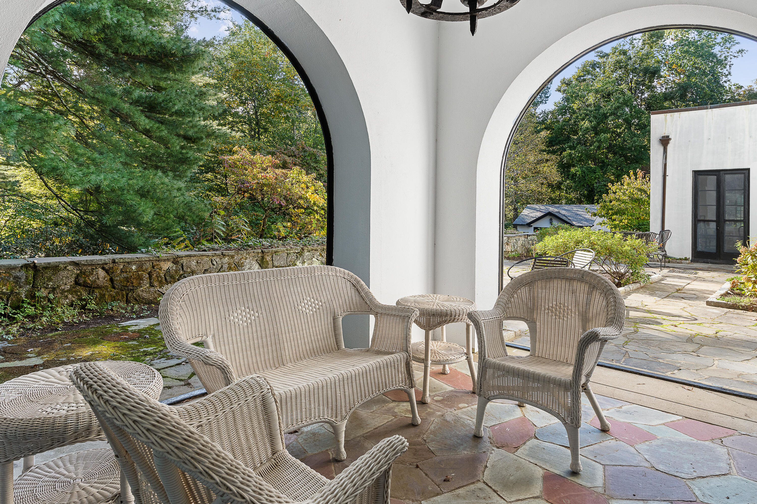 684 Westover Road Stamford, CT 06902 - Photo 10 of 25 a balcony with table and chairs