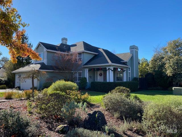1466 Hawk Crest Place Santa Rosa, CA 95409 - Photo 1 of 1 a front view of a house with garden