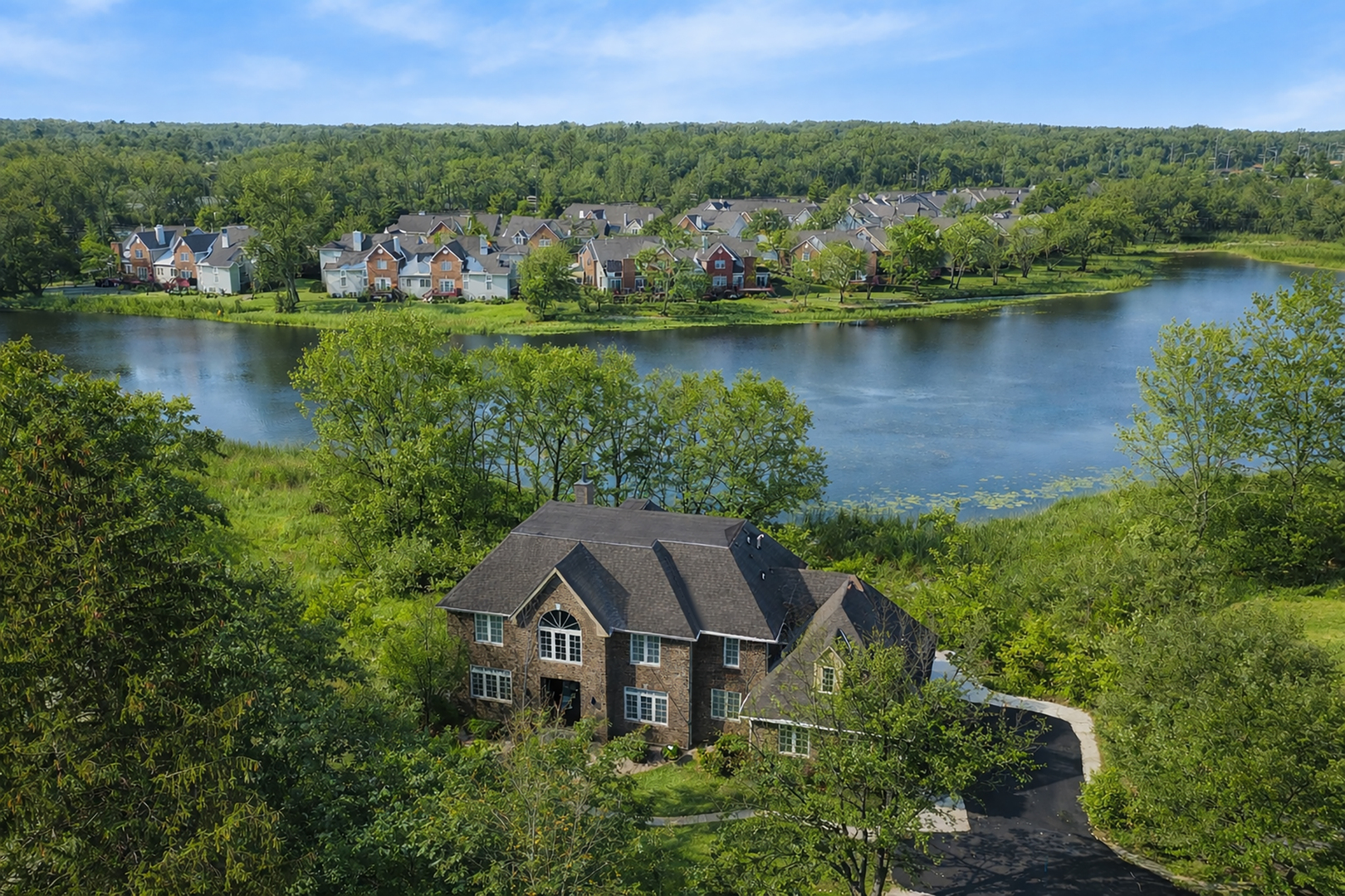 1481 Winnetka Street Palatine, IL 60067 - Photo 1 of 32 an aerial view of a house with a lake view