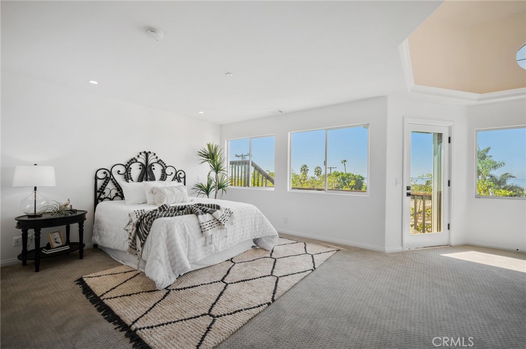 101 Esplanade San Clemente, CA 92672 - Photo 18 of 39 a spacious bedroom with a bed and a cabinets