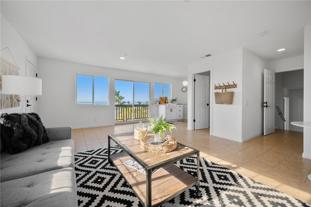 101 Esplanade San Clemente, CA 92672 - Photo 26 of 39 a living room with furniture and wooden floor