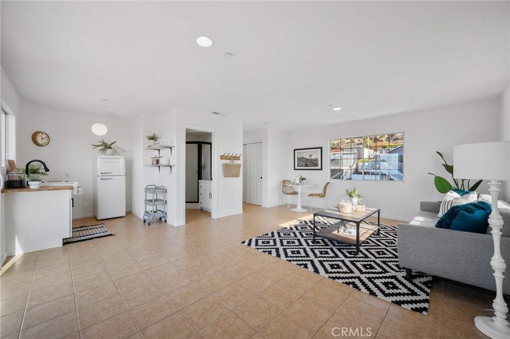 101 Esplanade San Clemente, CA 92672 - Photo 27 of 39 a living room with furniture and wooden floor