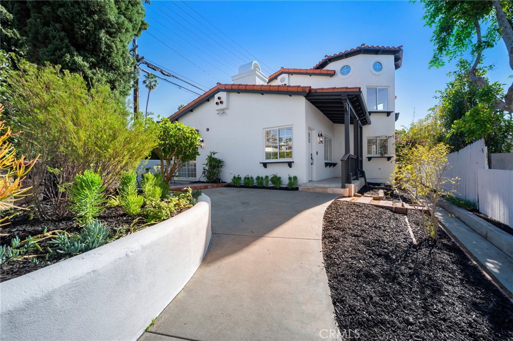 101 Esplanade San Clemente, CA 92672 - Photo 3 of 39 a front view of a house with a yard