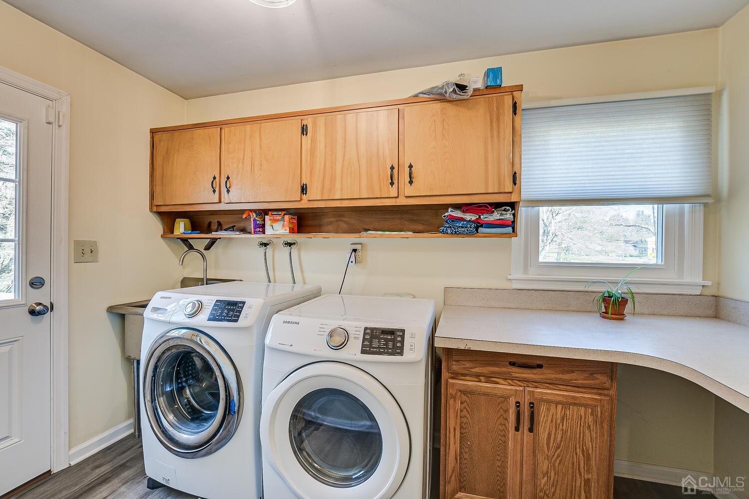 675 Country Club Road Bridgewater, NJ 08807 - Photo 29 of 58 a view of a kitchen with sink dryer and washer