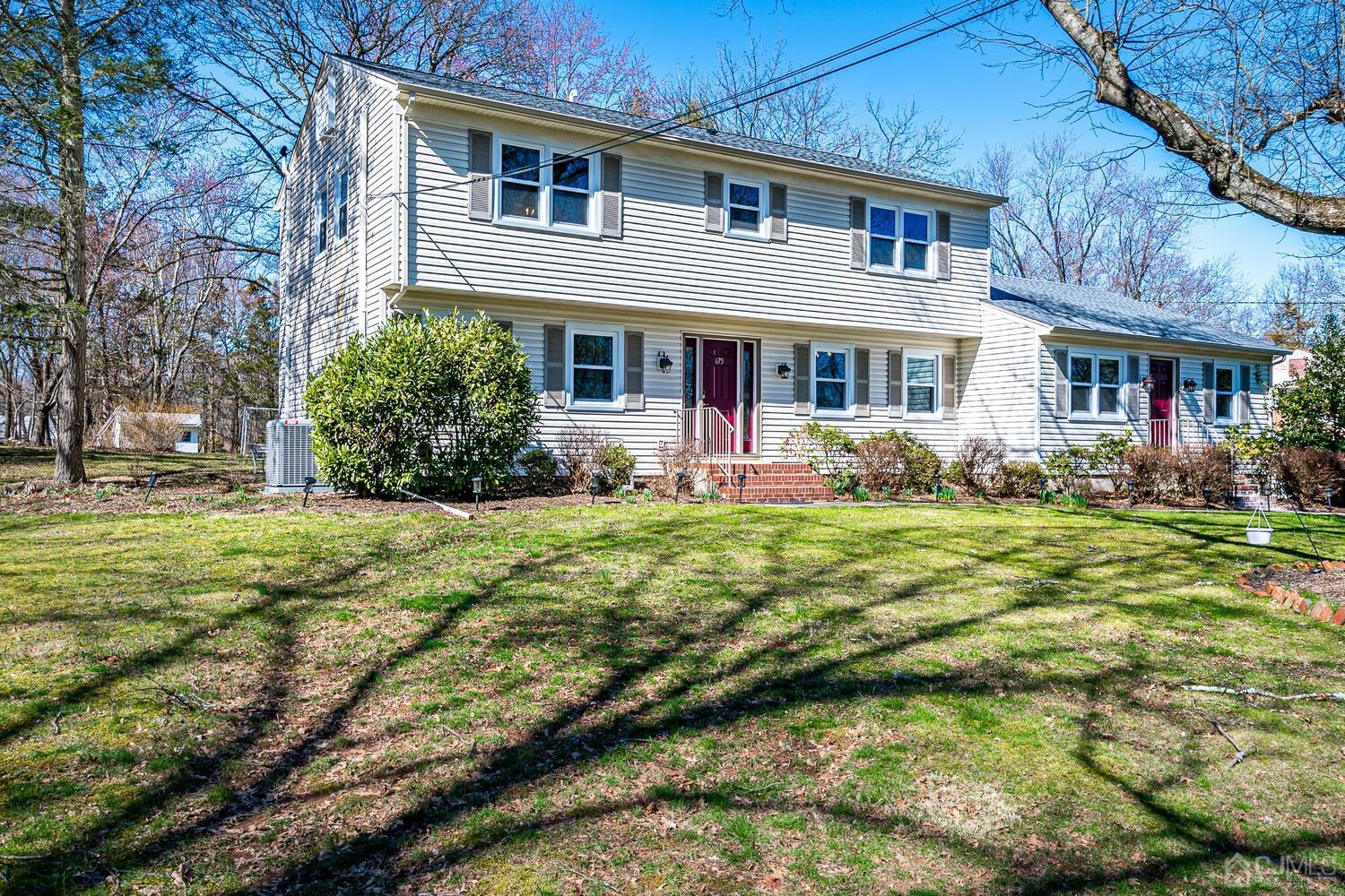 675 Country Club Road Bridgewater, NJ 08807 - Photo 3 of 58 a front view of a house with garden