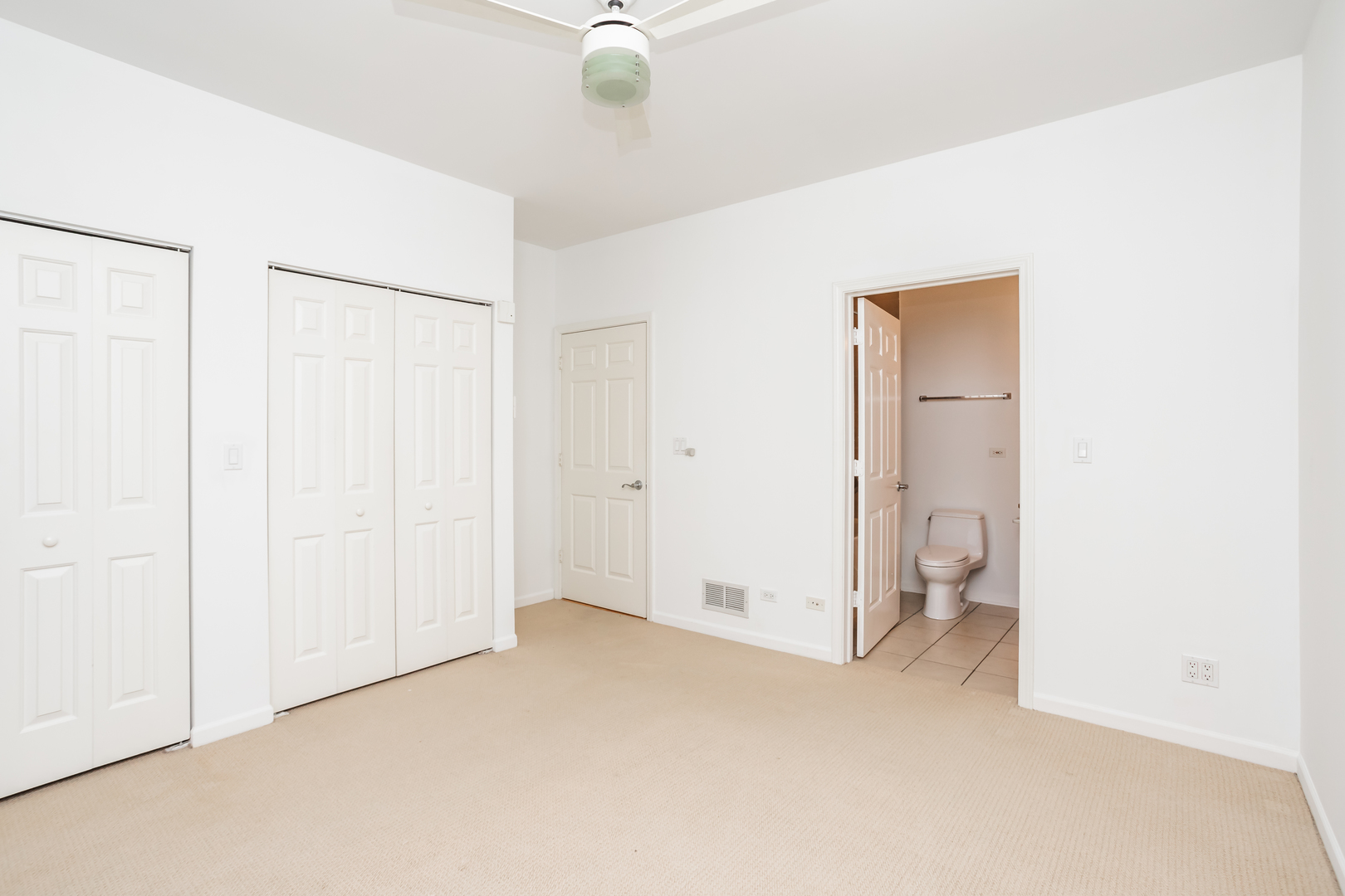 1418 South Halsted Street, Unit 1A Chicago, IL 60607 - Photo 9 of 19 a view of a room with a hallway