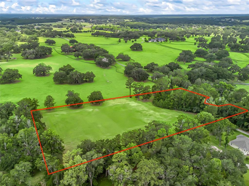84rd Terrace Northwest Ocala, FL 34482 - Photo 2 of 14 a view of a green field with lots of green space
