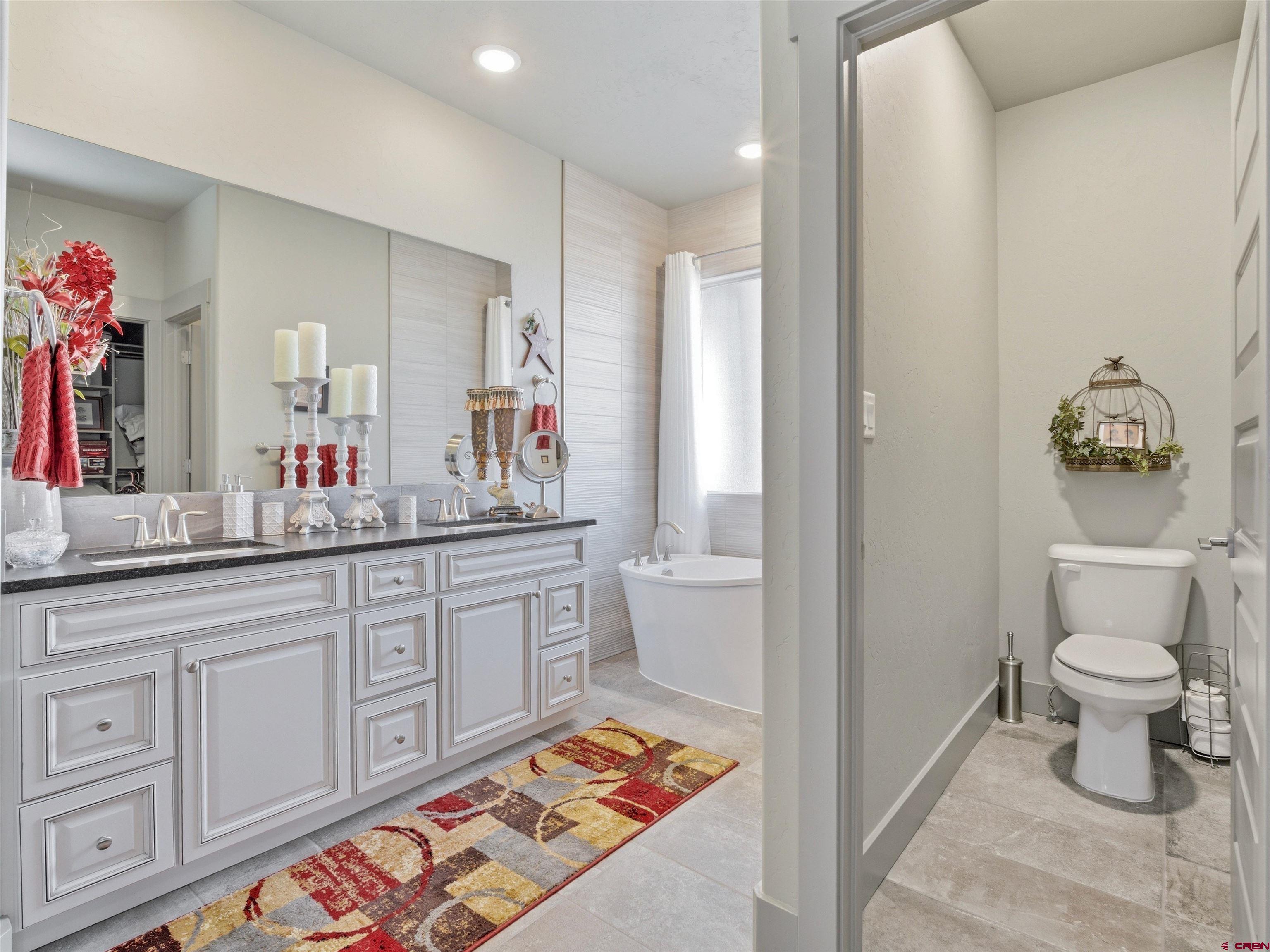 1223 Eagle Way Fruita, CO 81521 - Photo 18 of 34 a bathroom with a sink and a mirror