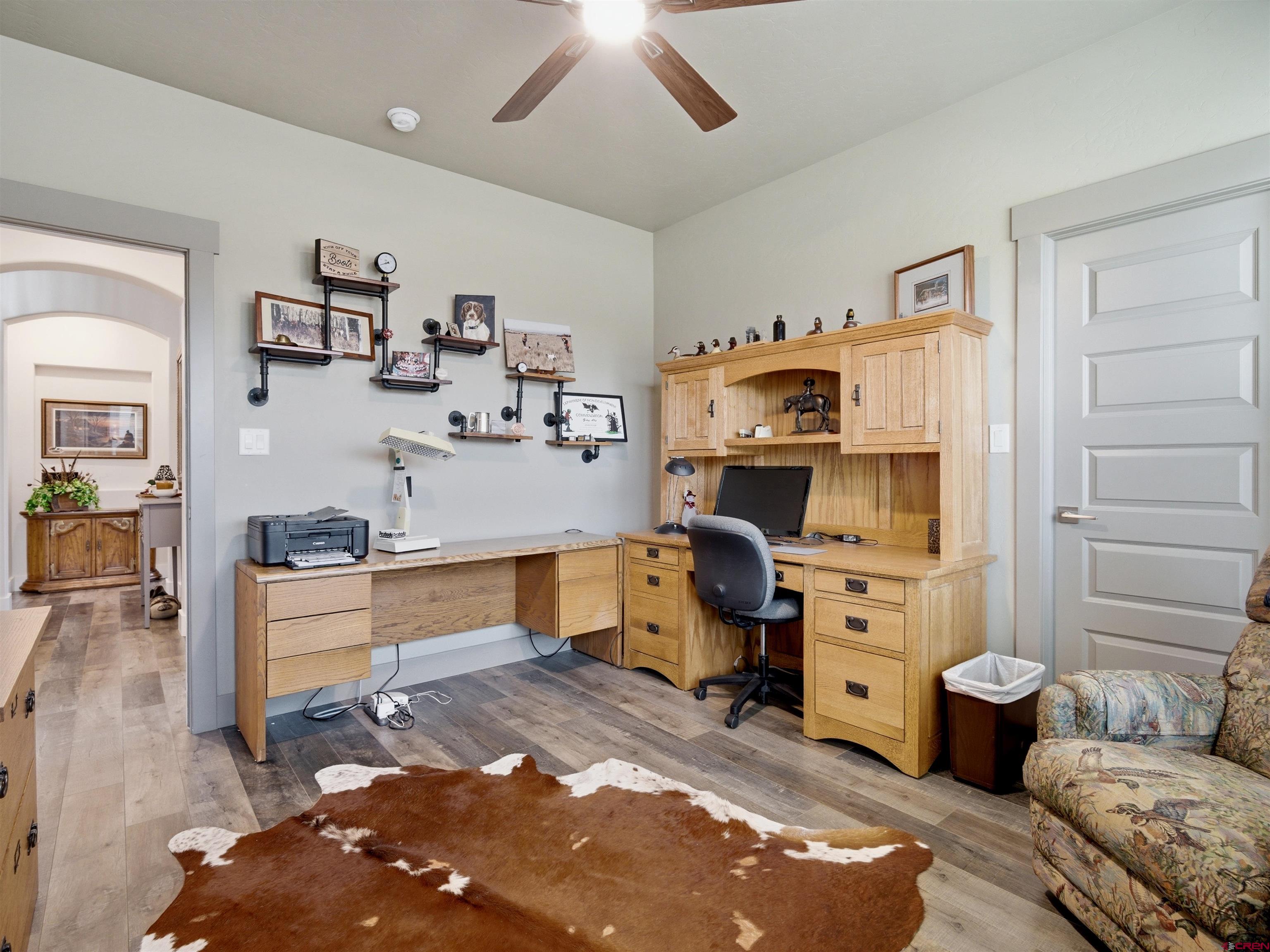 1223 Eagle Way Fruita, CO 81521 - Photo 24 of 34 a bedroom with a workspace