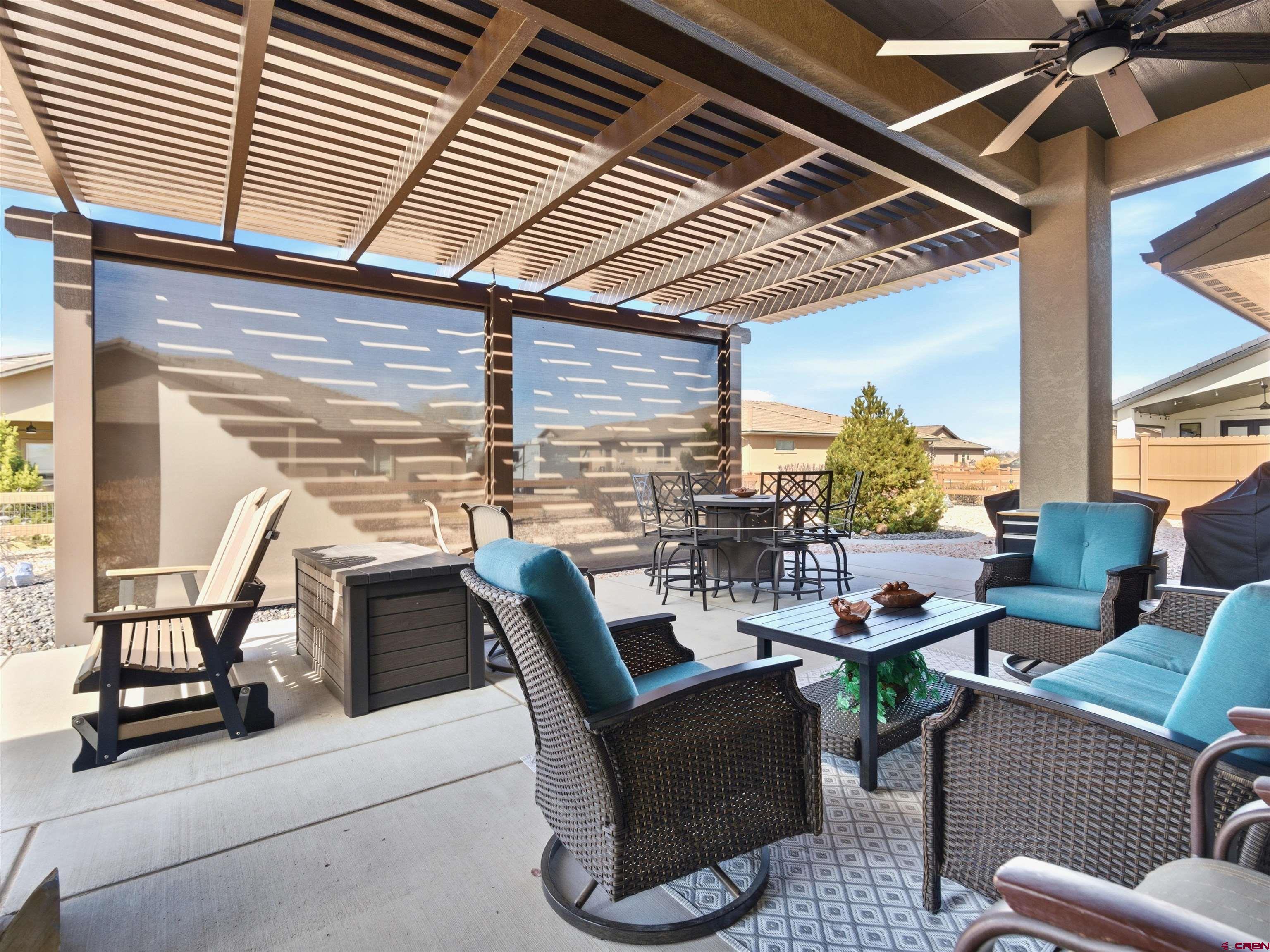 1223 Eagle Way Fruita, CO 81521 - Photo 28 of 34 a view of a patio with table and chairs