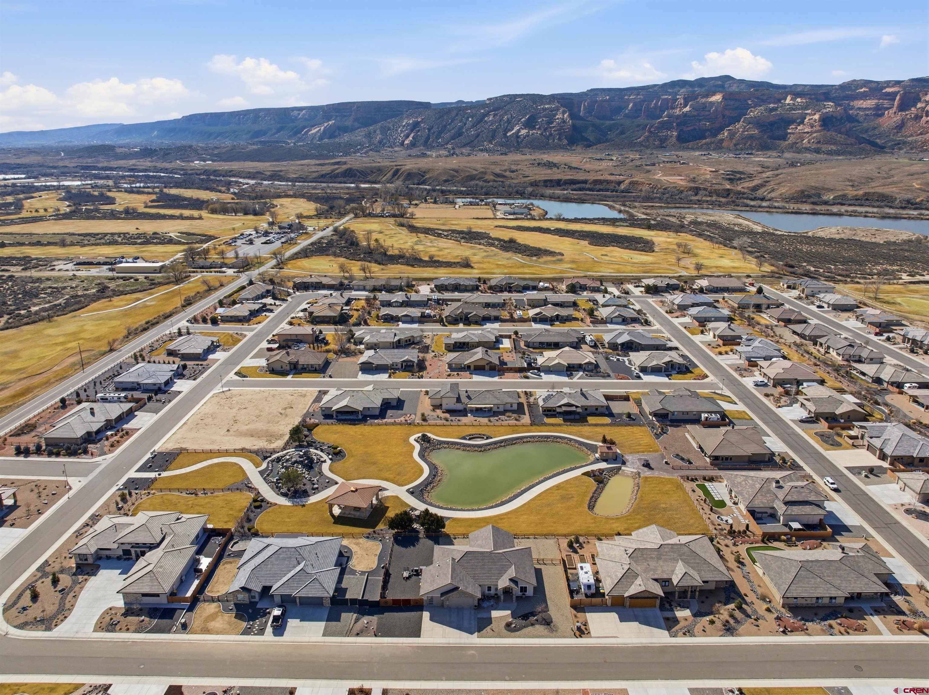 1223 Eagle Way Fruita, CO 81521 - Photo 31 of 34 a view of a swimming pool with an ocean view