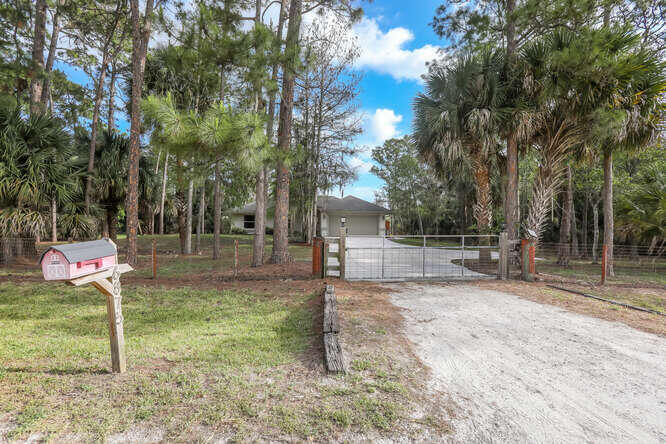 16875 63rd Road North Loxahatchee, FL 33470 - Photo 1 of 28 16875 63rd Rd N Wellington FL-small-001-