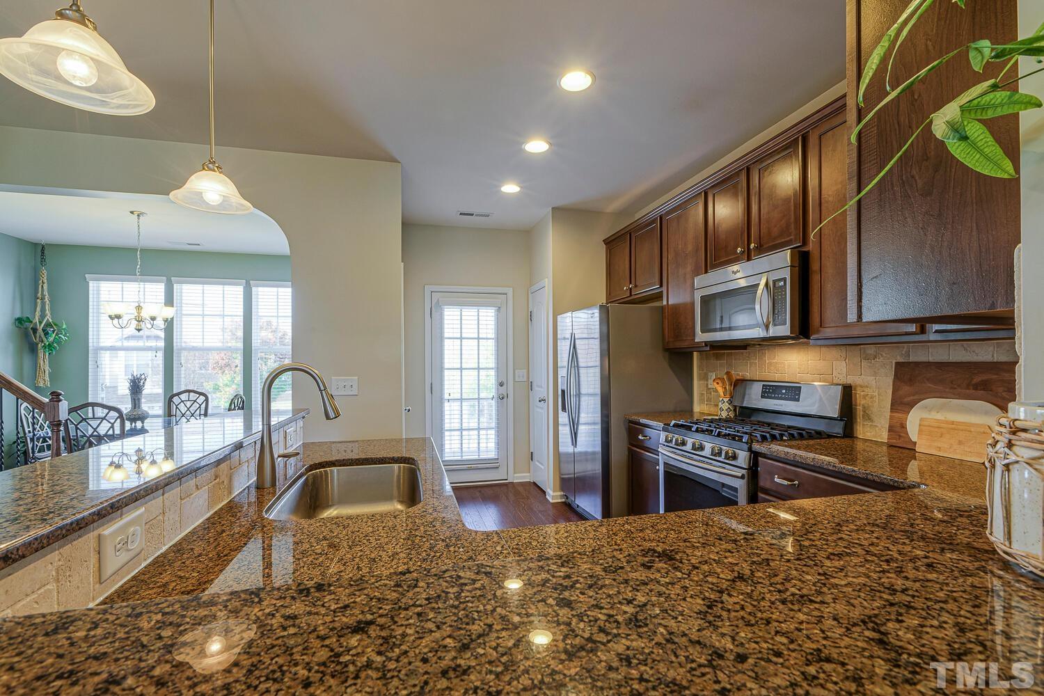 9108 Wooden Road Raleigh, NC 27617 - Photo 12 of 34 Arched Walls & Lots of Windows