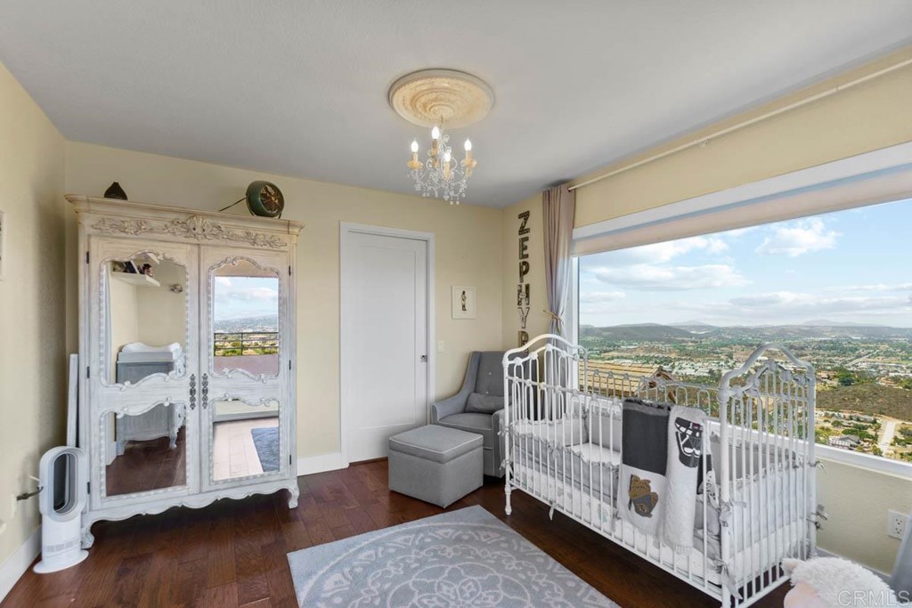 777 Phoenix Way San Marcos, CA 92078 - Photo 25 of 75 a bedroom with furniture and a large window