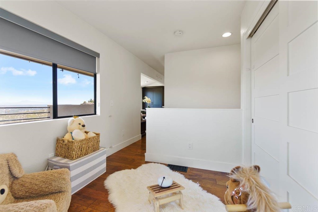 777 Phoenix Way San Marcos, CA 92078 - Photo 26 of 75 a living room with furniture and a window