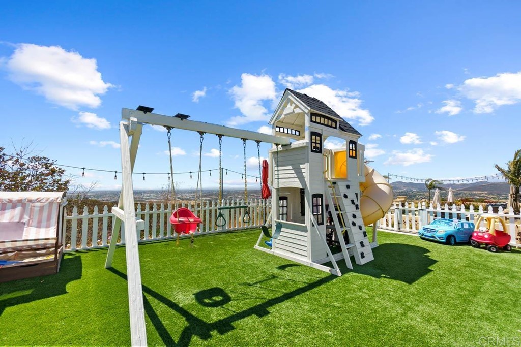 777 Phoenix Way San Marcos, CA 92078 - Photo 40 of 75 a view of a park with swings and slides