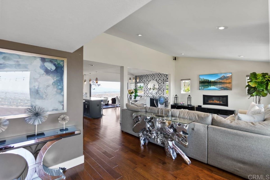 777 Phoenix Way San Marcos, CA 92078 - Photo 5 of 75 a living room with fireplace furniture and a wooden floor