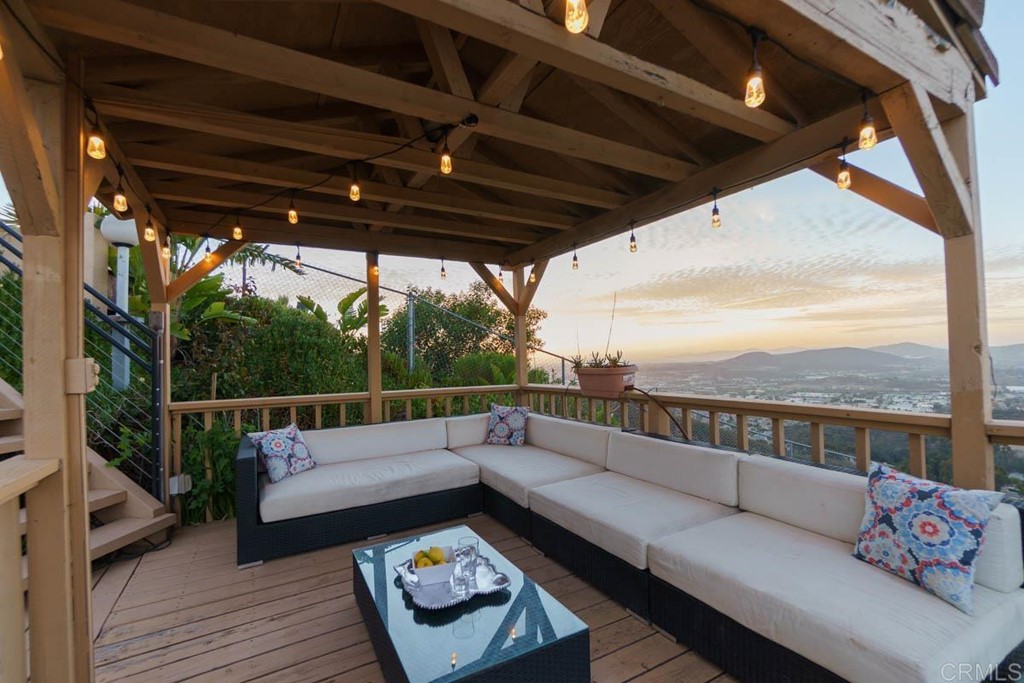 777 Phoenix Way San Marcos, CA 92078 - Photo 59 of 75 a view of a roof deck with couches and wooden floor